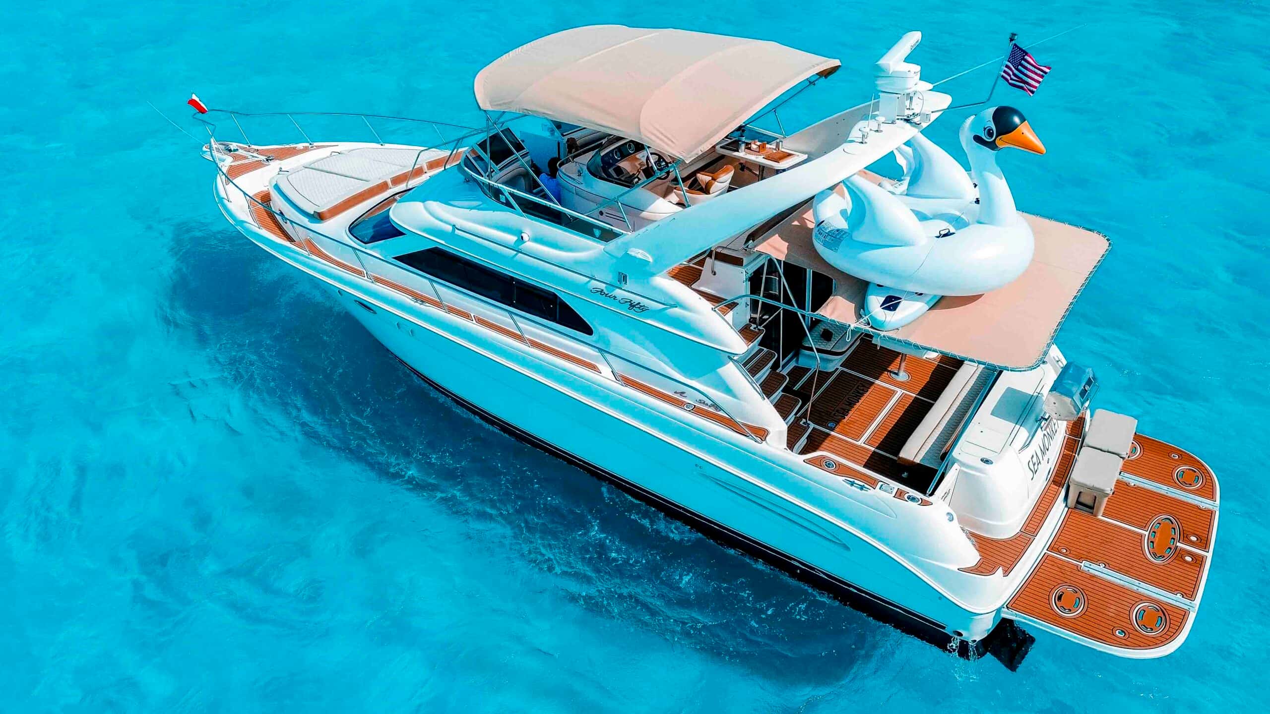 Aerial view of the stern of Sea Monkey, with the name on the transom, the swim platform and the cockpit