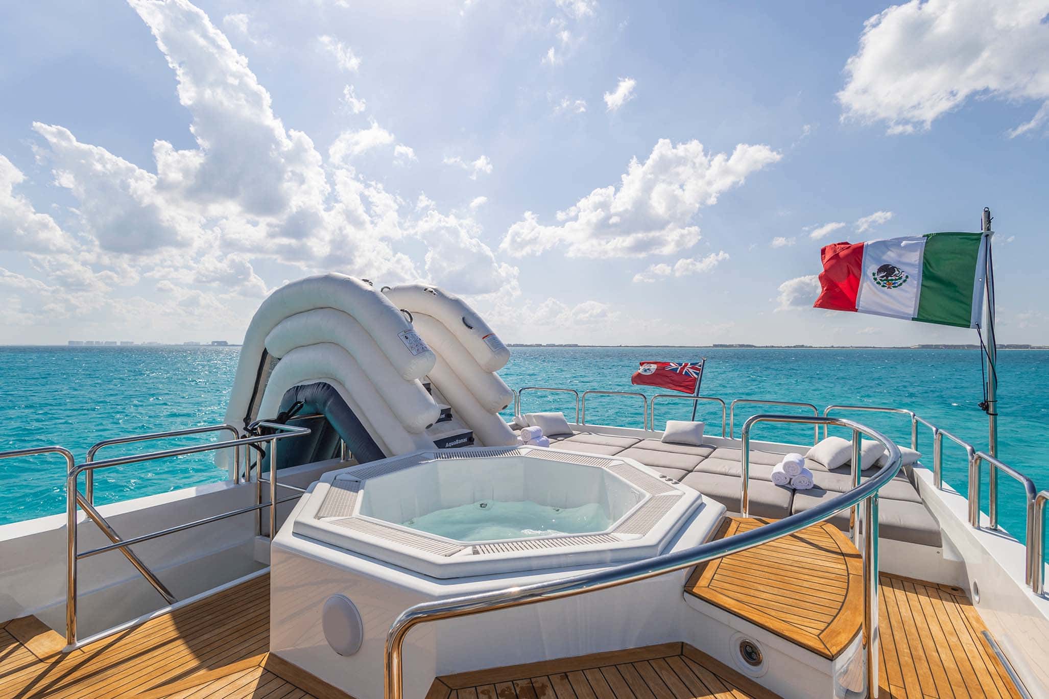 Jacuzzi with the folded water slide behind it