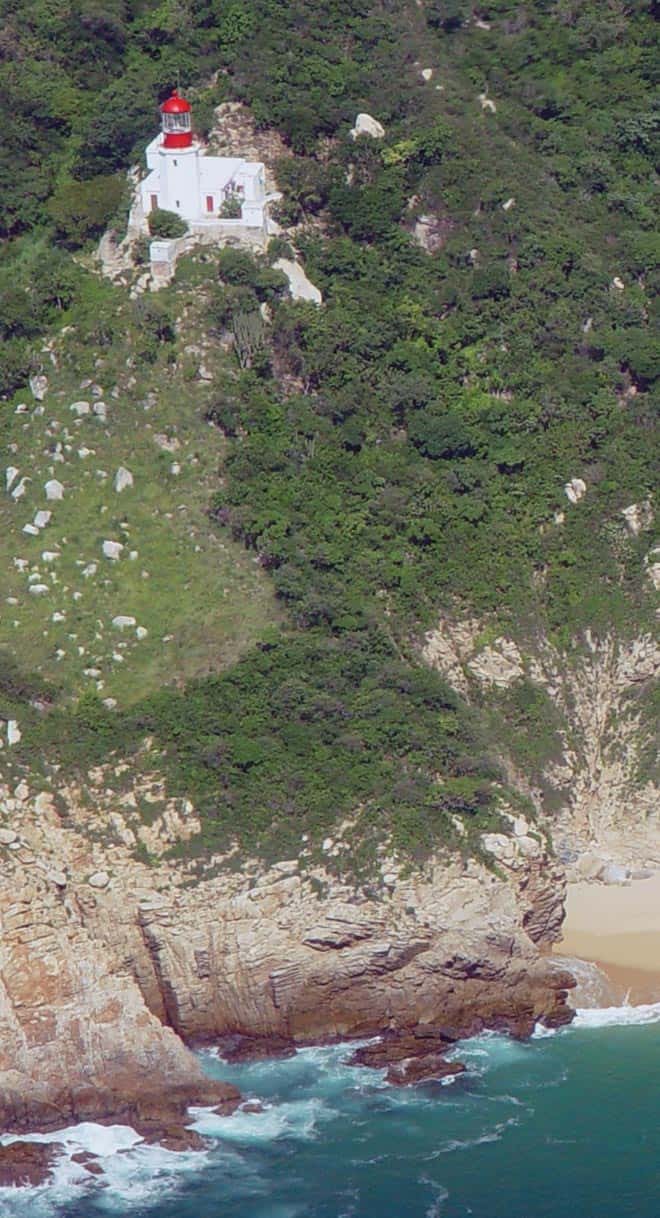 Cabo Corrientes: the lighthouse on the cape, seen from the air