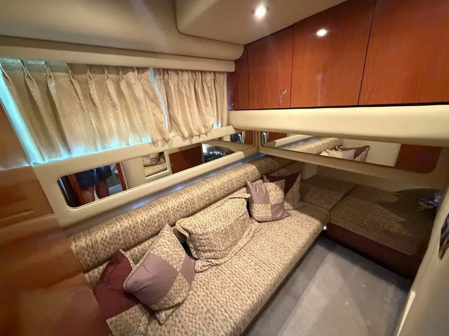 Twin cabin of another Sea Ray 480 Sedan Bridge with two single berths along the hull