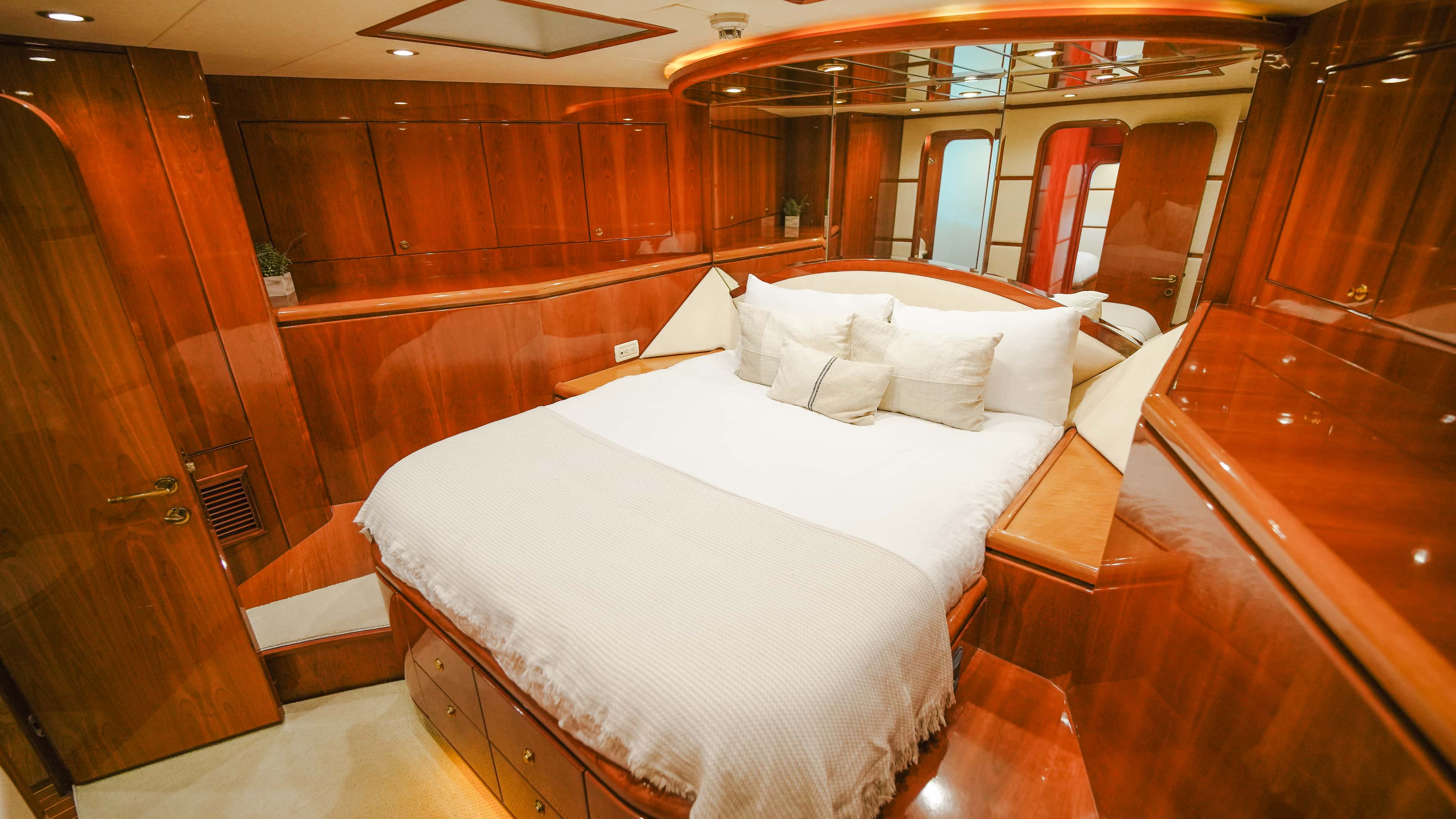 VIP cabin seen from the corner, mirrored ceiling above the bed